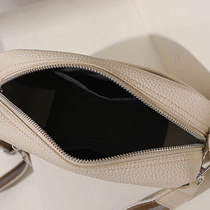 nora™ – practical cream-colored everyday bag