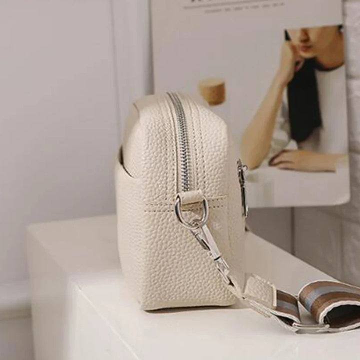 nora™ – practical cream-colored everyday bag